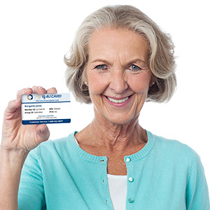 woman holding up prescription card